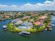 Luxury waterfront home with private island setting and boat dock at 1024 Sonata Ln, Apollo Beach, FL 33572