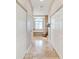 Elegant bathroom with double vanity, soaking tub, and tile flooring at 1024 Sonata Ln, Apollo Beach, FL 33572