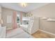 ' bedroom with a bunk bed, playful decor, and a large window at 1024 Sonata Ln, Apollo Beach, FL 33572