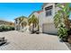 Two-story house with a large driveway and palm trees at 1024 Sonata Ln, Apollo Beach, FL 33572