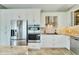 Modern kitchen with stainless steel appliances and granite countertops at 1024 Sonata Ln, Apollo Beach, FL 33572