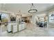 Open concept living room with high ceilings and water views at 1024 Sonata Ln, Apollo Beach, FL 33572