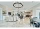 Spacious living room featuring high ceilings, a fireplace, and ample natural light at 1024 Sonata Ln, Apollo Beach, FL 33572