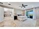 Bright and airy main bedroom with access to the outdoor patio at 1024 Sonata Ln, Apollo Beach, FL 33572