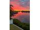 Breathtaking sunset over the calm waters at 1024 Sonata Ln, Apollo Beach, FL 33572
