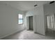 Simple bedroom with closet and window at 10658 Rainsville St, Port Charlotte, FL 33981