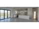 Modern kitchen with white cabinets and island at 10658 Rainsville St, Port Charlotte, FL 33981