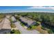 Aerial view of community with houses and trees at 11440 Baronwood Ct, Hudson, FL 34667