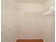 Walk-in closet with wire shelving and hanging rods at 11440 Baronwood Ct, Hudson, FL 34667