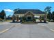 Gated community entrance with guard house at 11440 Baronwood Ct, Hudson, FL 34667