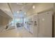Bright kitchen features white cabinets, ample counter space, and modern appliances at 11440 Baronwood Ct, Hudson, FL 34667
