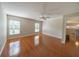 Living room with wood flooring and neutral color walls at 11440 Baronwood Ct, Hudson, FL 34667