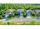 Aerial view of a house on a residential street at 12211 Oak Ramble Dr, Spring Hill, FL 34610