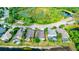 Aerial view of houses with conservation lot and lake views at 12211 Oak Ramble Dr, Spring Hill, FL 34610