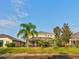 House exterior view, backyard, lush grass at 12211 Oak Ramble Dr, Spring Hill, FL 34610