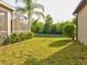 Spacious backyard with lush grass at 12211 Oak Ramble Dr, Spring Hill, FL 34610