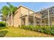Landscaped backyard with lush greenery at 12211 Oak Ramble Dr, Spring Hill, FL 34610