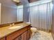 Simple bathroom with granite countertop and shower/tub combo at 12211 Oak Ramble Dr, Spring Hill, FL 34610
