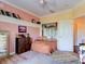 Bright bedroom with window seat and ample closet space at 12211 Oak Ramble Dr, Spring Hill, FL 34610
