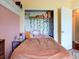 Cozy bedroom with a built-in closet and charming decor at 12211 Oak Ramble Dr, Spring Hill, FL 34610
