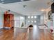 Spacious bonus room with hardwood floors and plenty of natural light at 12211 Oak Ramble Dr, Spring Hill, FL 34610