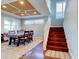 Bright dining room with hardwood floors and a unique ceiling at 12211 Oak Ramble Dr, Spring Hill, FL 34610