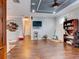 Home office with hardwood floors, built-in shelving and window at 12211 Oak Ramble Dr, Spring Hill, FL 34610