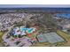 Aerial view of community amenities including pools, tennis, and basketball courts at 12931 Twin Bridges Dr, Riverview, FL 33579
