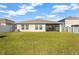 Large backyard with grassy area at 12931 Twin Bridges Dr, Riverview, FL 33579