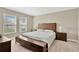 Spacious bedroom with a king-size bed and plenty of natural light at 12931 Twin Bridges Dr, Riverview, FL 33579