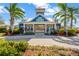 Community clubhouse with a covered porch at 12931 Twin Bridges Dr, Riverview, FL 33579