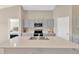 Modern kitchen with gray cabinets, stainless steel appliances, and an island at 12931 Twin Bridges Dr, Riverview, FL 33579
