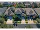 Aerial view of homes with two-car garages and landscaping at 1317 Lorea Ln, Brandon, FL 33511