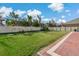 Large backyard with grassy lawn and privacy fence at 1317 Lorea Ln, Brandon, FL 33511