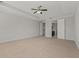 Spacious primary bedroom with ample natural light and ensuite bathroom access at 1317 Lorea Ln, Brandon, FL 33511