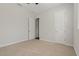 Well-lit bedroom with neutral walls and carpet at 1317 Lorea Ln, Brandon, FL 33511