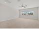 Spacious bedroom with ceiling fan and neutral carpet at 1317 Lorea Ln, Brandon, FL 33511