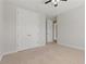 Bright bedroom with carpet flooring and double door closet at 1317 Lorea Ln, Brandon, FL 33511