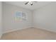 Bright bedroom with window and ceiling fan at 1317 Lorea Ln, Brandon, FL 33511