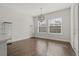 Formal dining room with hardwood floors and large windows at 1317 Lorea Ln, Brandon, FL 33511