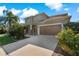 Two-story house with a brown garage door at 1317 Lorea Ln, Brandon, FL 33511