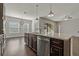 Large kitchen island with seating and stainless steel appliances at 1317 Lorea Ln, Brandon, FL 33511