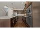 Modern kitchen with stainless steel appliances and ample cabinetry at 1317 Lorea Ln, Brandon, FL 33511
