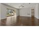 Bright living room featuring hardwood floors and sliding glass doors at 1317 Lorea Ln, Brandon, FL 33511