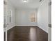Bright home office with hardwood floors and neutral walls at 1317 Lorea Ln, Brandon, FL 33511