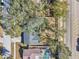 House and yard viewed from above, showing a pool next door at 13214 Moran Dr, Tampa, FL 33618