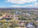Aerial view of a house in a quiet neighborhood near a lake at 13214 Moran Dr, Tampa, FL 33618