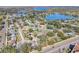 Community overview featuring various houses and a lake at 13214 Moran Dr, Tampa, FL 33618