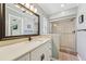Bright bathroom with walk-in shower and updated vanity at 13214 Moran Dr, Tampa, FL 33618