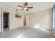 Bright bedroom with ceiling fan and large closet at 13214 Moran Dr, Tampa, FL 33618